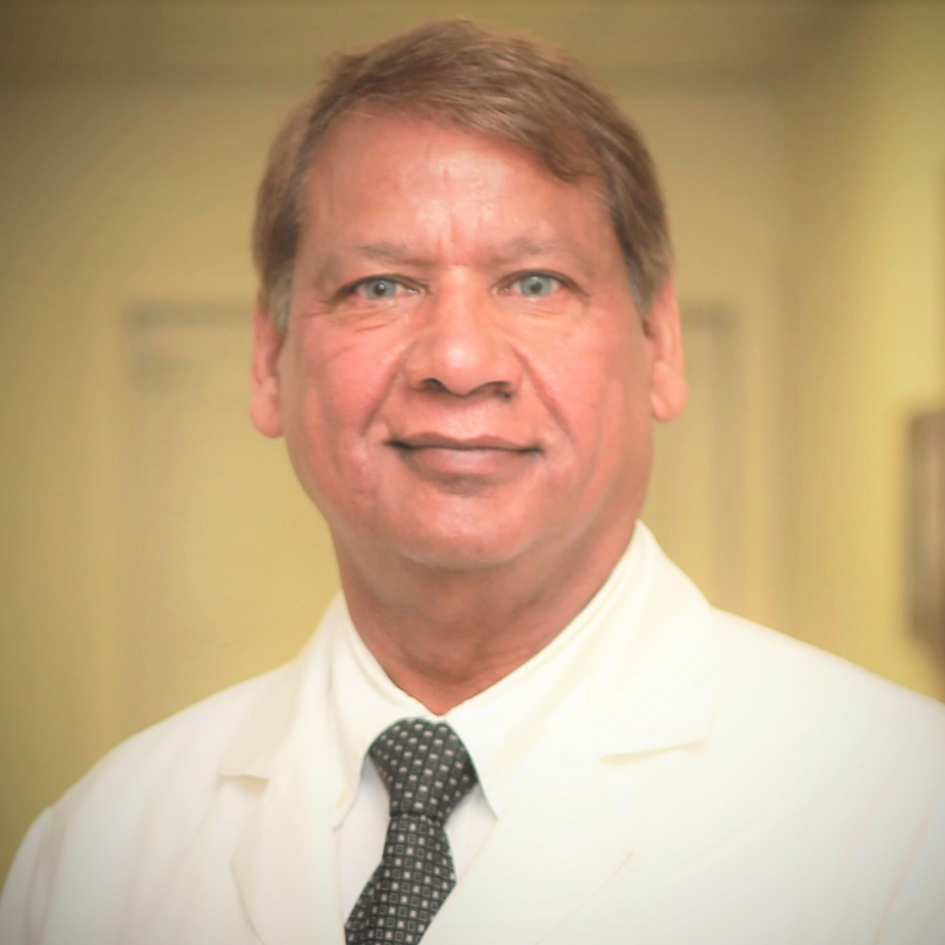 Dr. Bikan Octain, MD