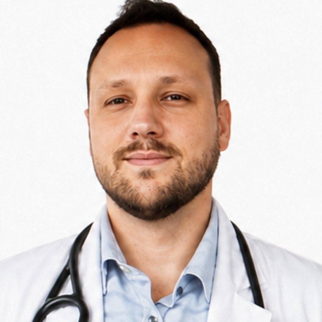 Travis Birkhead, MD